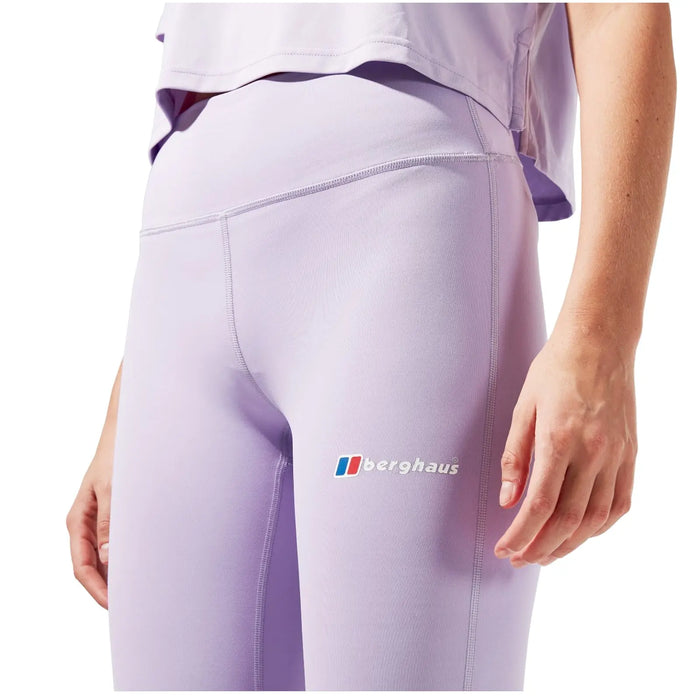 A person is wearing fitted lavender leggings. The leggings feature the logo of the brand Berghaus. The setting is likely casual or athletic, emphasizing comfort and style.