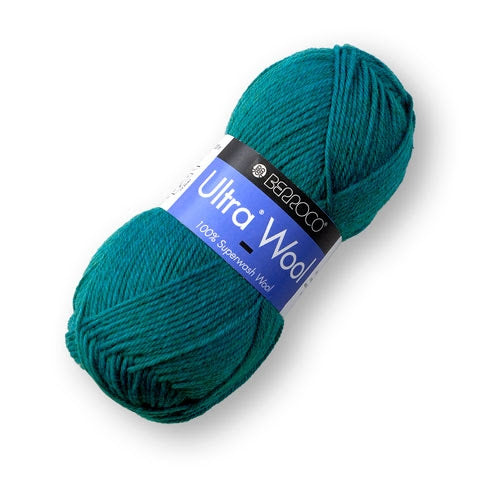 A skein of Berroco Ultra Wool yarn in a teal color with a blue and black label saying ‘Berroco Ultra Wool’ against a white background.