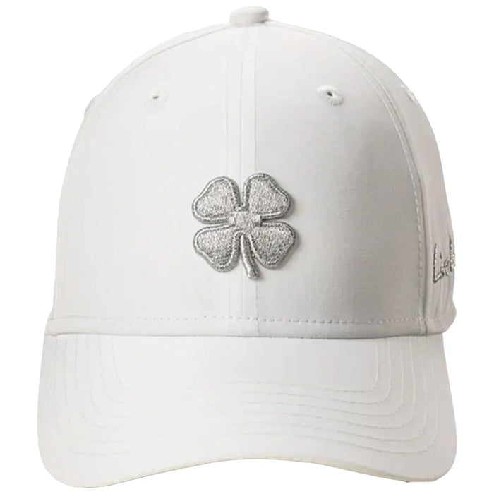 A white baseball cap with a silver embroidered four-leaf clover on the front is displayed against a simple background highlighting its design and features.